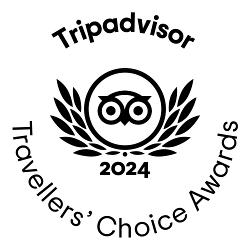 Tripadvisor Travellers' Choice Awards 2024 logo featuring an owl and laurel leaves, symbolizing recognition of top-rated travel experiences.